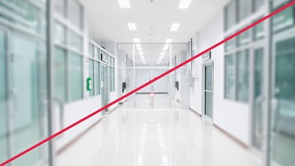 An example of a picture that does not embody the HARTMANN visual language. The picture shows a sterile and cold hospital corridor. 