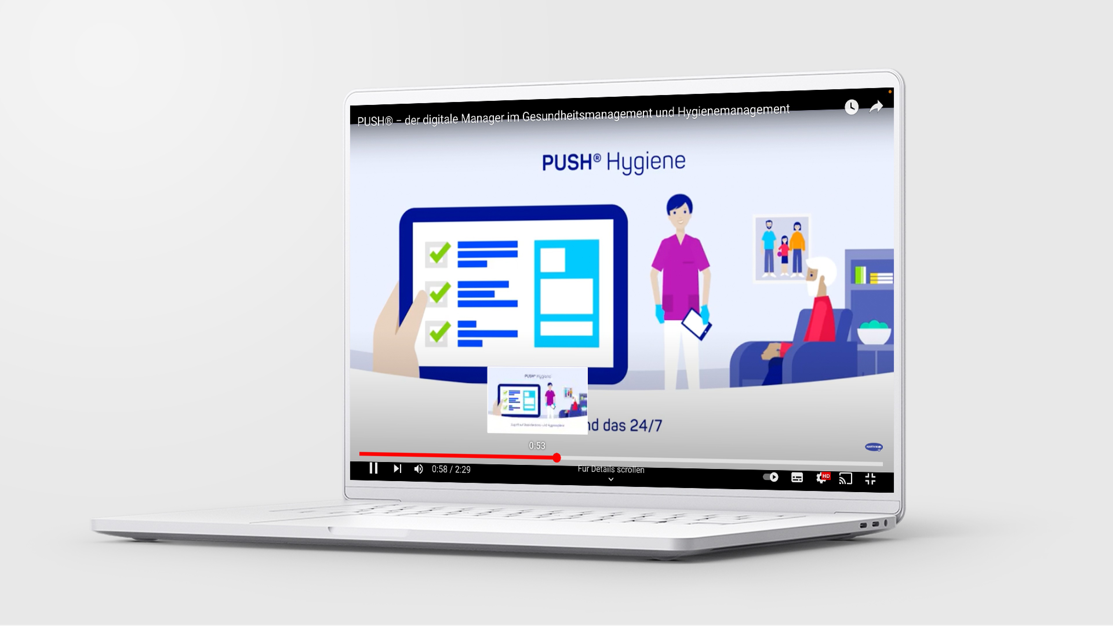 A laptop showing an animated HARTMANN video.