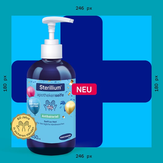 Sterillium apothecary liquid soap bottle with pump dispenser in a limited birthday edition design, featuring colorful balloons, a 'NEW' label, and a gold badge marking 60 years of safe hands, set against a large blue cross on a turquoise background